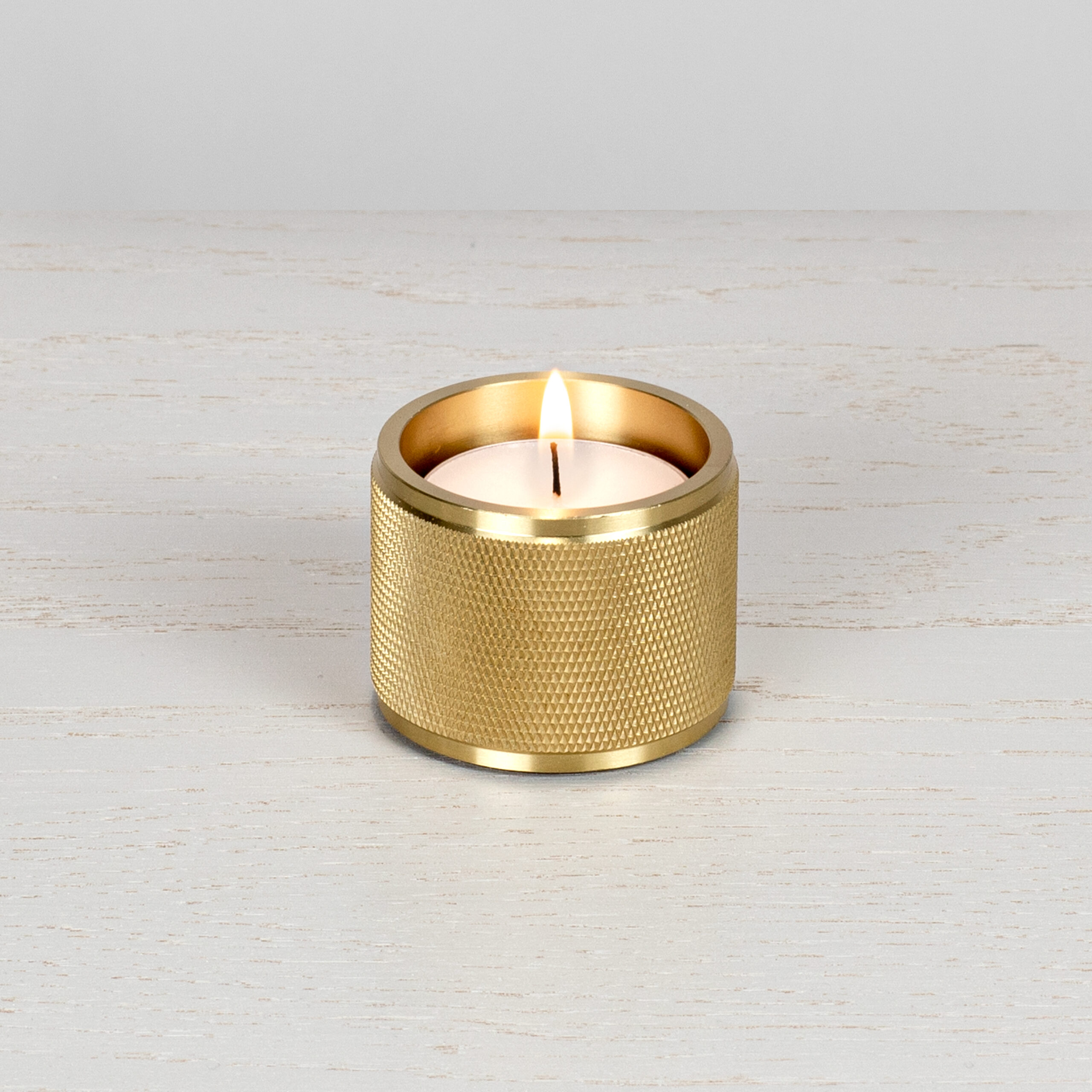 2.Buster+Punch_Tealight_Candle_Holder__Brass_Front_on